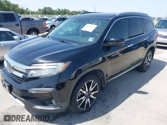 2021 Honda Pilot Elite with VIN 5FNYF6H02MB079610, listed as a IAAI auction lot 42309677 with 51,451 mi miles and . Bid and sale history available at DreamBid. Image 17.