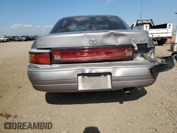 1994 Toyota Camry LE z VIN JT2SK12E7R0253579, wystawiony jako Copart lot #64373175 z przebiegiem 256 168 mil mil oraz Szkoda całkowita • Salvage title. Historia ofert i sprzedaży dostępna na DreamBid. Obrazek 6.