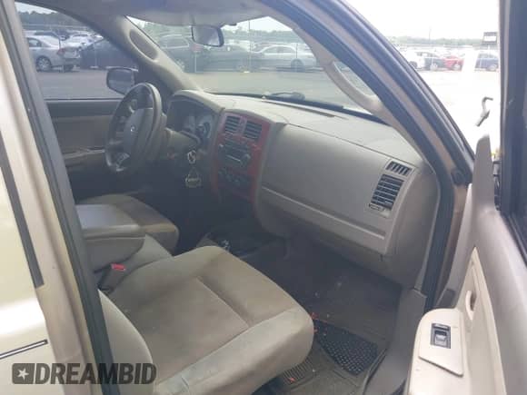 2005 Dodge Dakota SLT with VIN 1D7HW48N95S269592, listed as a IAAI auction lot 42675637 with 153,456 mi miles and . Bid and sale history available at DreamBid. Image 5.