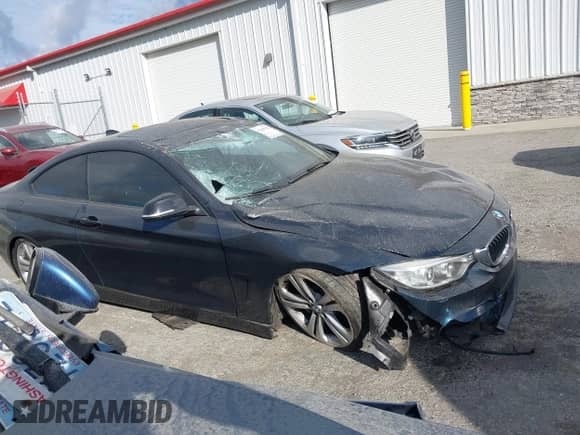 2014 BMW 4 Series 435i with VIN WBA3R1C51EK192800, listed as a IAAI auction lot 43455570 with 97,909 mi miles and . Bid and sale history available at DreamBid. Image 13.