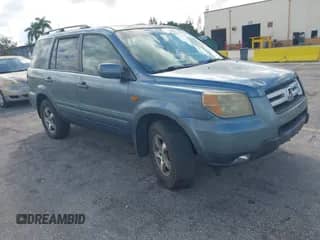 2006 Honda Pilot EX-L with VIN 5FNYF18546B009463, listed as a IAAI auction lot 43517616 with 213,658 mi miles and . Bid and sale history available at DreamBid. Image 1.