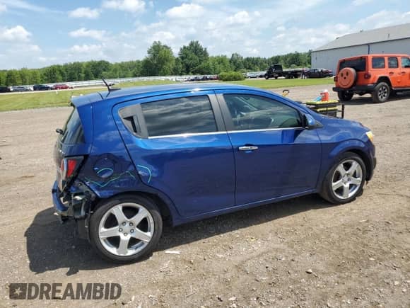 2014 Chevrolet Sonic LTZ с VIN 1G1JE6SB7E4221675, выставлен на аукционе Copart как лот 66685495 с пробегом 142 096 миль миль и Списание • Salvage title. История ставок и продаж доступна на DreamBid. Изображение 3.