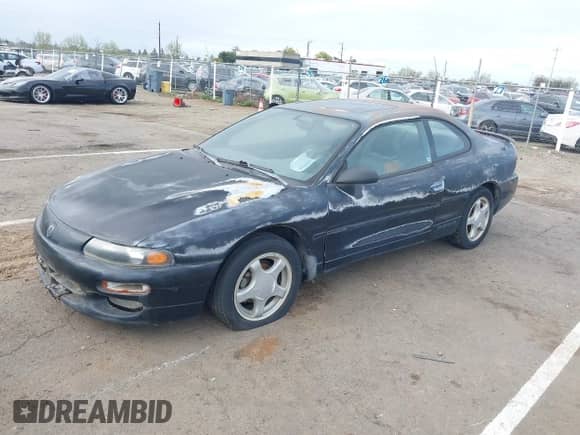 1996 Dodge Avenger with VIN 4B3AU52N6TE335141, listed as a IAAI auction lot 41909504 with 122,444 mi miles and . Bid and sale history available at DreamBid. Image 2.
