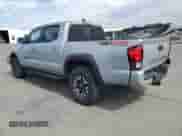 2019 Toyota Tacoma TRD Off Road z VIN 3TMCZ5AN7KM210332, wystawiony jako Copart lot #81743135 z przebiegiem 90 681 mil mil oraz Szkoda całkowita • Salvage title. Historia ofert i sprzedaży dostępna na DreamBid. Obrazek 2.