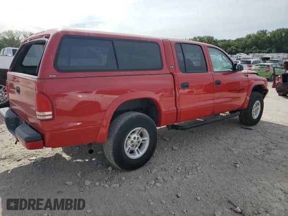 2000 Dodge Dakota Sport with VIN 1B7GG2AN9YS713530, listed as a Copart auction lot 70316645 with 159,482 mi miles and Salvage title. Bid and sale history available at DreamBid. Image 3.