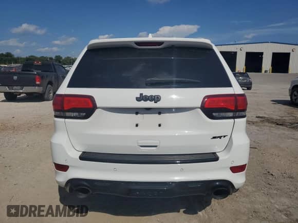 2021 Jeep Grand Cherokee SRT with VIN 1C4RJFDJ2MC591057, listed as a Copart auction lot 68909655 with 52,028 mi miles and Salvage title. Bid and sale history available at DreamBid. Image 6.