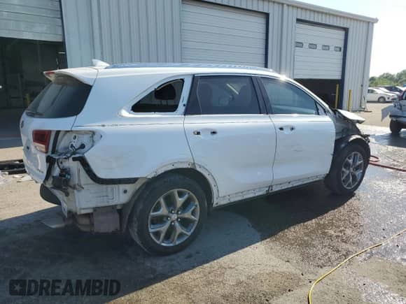 2017 Kia Sorento SXL z VIN 5XYPK4A57HG317564, wystawiony jako Copart lot #53671065 z przebiegiem 131 030 mil mil oraz Szkoda całkowita • Salvage title. Historia ofert i sprzedaży dostępna na DreamBid. Obrazek 3.