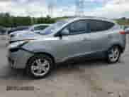 2013 Hyundai Tucson GLS z VIN KM8JUCAC7DU728931, wystawiony jako Copart lot #64497845 z przebiegiem 198 224 mil mil oraz Szkoda całkowita • Salvage title. Historia ofert i sprzedaży dostępna na DreamBid. Obrazek 1.