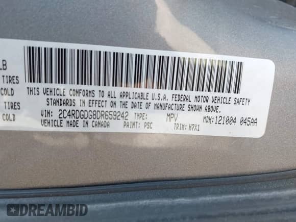 2013 Dodge Grand Caravan Crew z VIN 2C4RDGDG8DR659242, wystawiony jako IAAI lot #42557248 z przebiegiem 165 305 mil mil oraz . Historia ofert i sprzedaży dostępna na DreamBid. Obrazek 9.