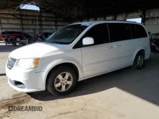 2011 Dodge Grand Caravan Mainstreet with VIN 2D4RN3DG6BR742139, listed as a Copart auction lot 71022515 with 126,565 mi miles and Salvage title. Bid and sale history available at DreamBid. Image 1.