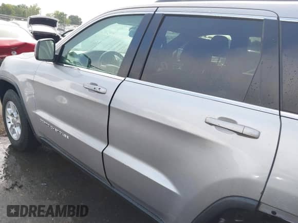2016 Jeep Grand Cherokee Laredo with VIN 1C4RJFAG5GC444471, listed as a IAAI auction lot 43011713 with 169,413 mi miles and . Bid and sale history available at DreamBid. Image 14.