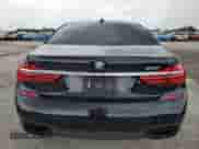 2019 BMW 7 Series 750i with VIN WBA7F0C53KGM25904, listed as a Copart auction lot 64657215 with 48,995 mi miles and Salvage title. Bid and sale history available at DreamBid. Image 6.