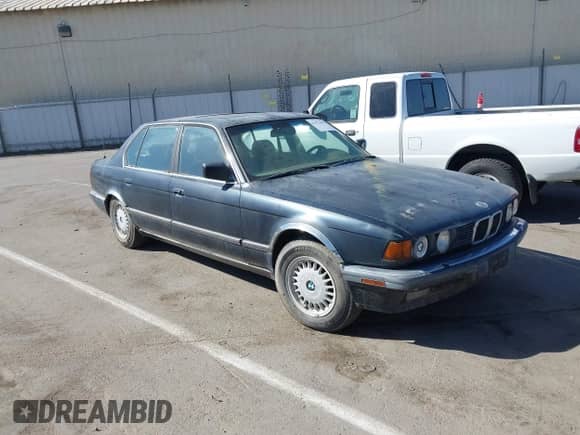 1990 BMW 7 Series with VIN WBAGC4313LDC24751, listed as a IAAI auction lot 42922461 with 221,464 mi miles and . Bid and sale history available at DreamBid. Image 1.