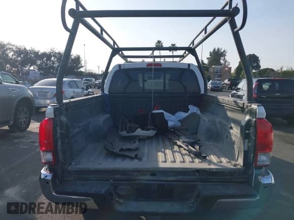 2018 Toyota Tacoma SR5 with VIN 5TFRZ5CN3JX064821, listed as a IAAI auction lot 41478807 with 106,495 mi miles and . Bid and sale history available at DreamBid. Image 17.