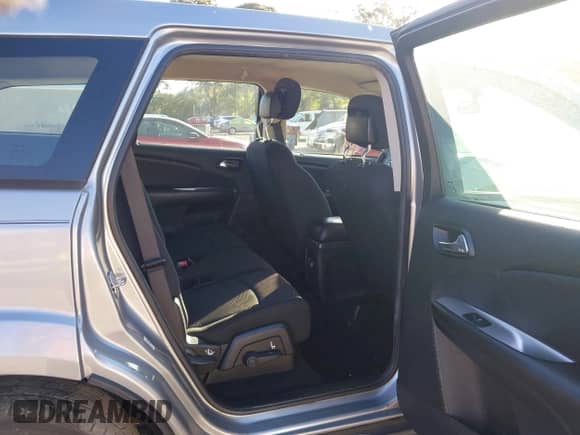 2015 Dodge Journey SE with VIN 3C4PDCAB9FT679850, listed as a IAAI auction lot 43379194 with 96,978 mi miles and . Bid and sale history available at DreamBid. Image 8.