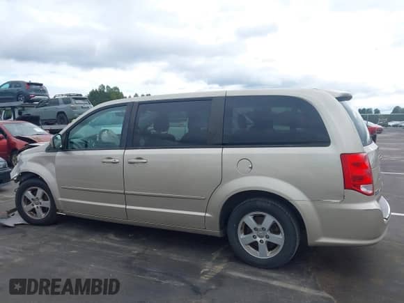 2012 Dodge Grand Caravan SXT z VIN 2C4RDGCG1CR399332, wystawiony jako IAAI lot #43444930 z przebiegiem 151 325 mil mil oraz . Historia ofert i sprzedaży dostępna na DreamBid. Obrazek 14.