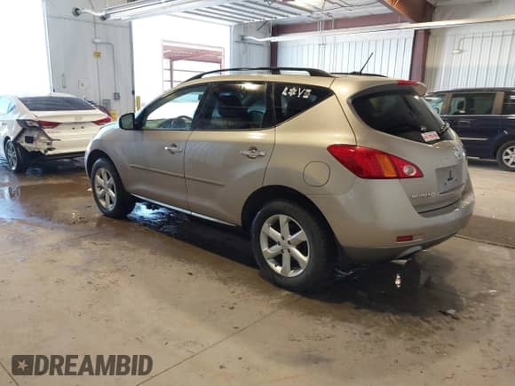 2009 Nissan Murano S with VIN JN8AZ18W99W123562, listed as a IAAI auction lot 43273297 with 69,319 mi miles and . Bid and sale history available at DreamBid. Image 3.
