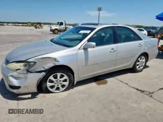 2006 Toyota Camry XLE с VIN 4T1BF32KX6U117976, выставлен на аукционе Copart как лот 67221655 с пробегом 152 103 миль миль и Списание • Salvage title. История ставок и продаж доступна на DreamBid. Изображение 1.