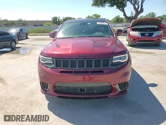 2021 Jeep Grand Cherokee Trackhawk with VIN 1C4RJFN95MC717996, listed as a Copart auction lot 59463095 with 16,896 mi miles and Salvage title. Bid and sale history available at DreamBid. Image 13.