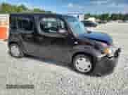 2013 Nissan Cube S z VIN JN8AZ2KR3DT304949, wystawiony jako Copart lot #71396525 z przebiegiem 107 779 mil mil oraz Szkoda całkowita • Salvage title. Historia ofert i sprzedaży dostępna na DreamBid. Obrazek 4.