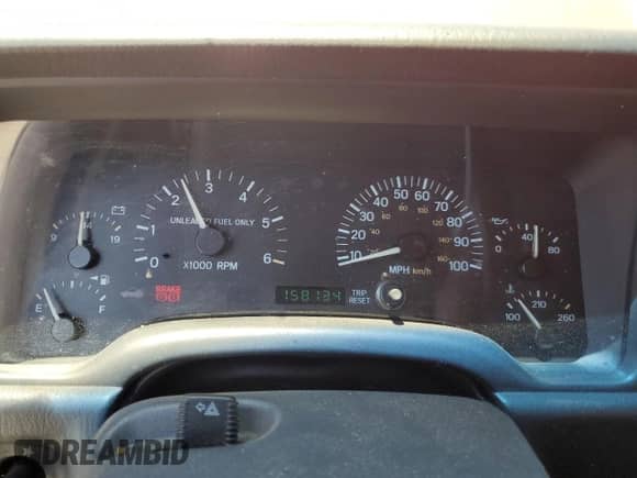 1999 Jeep Grand Cherokee with VIN 1J4FT67SXXL636357, listed as a Copart auction lot 67971004 with 158,134 mi miles and Clean title. Bid and sale history available at DreamBid. Image 9.