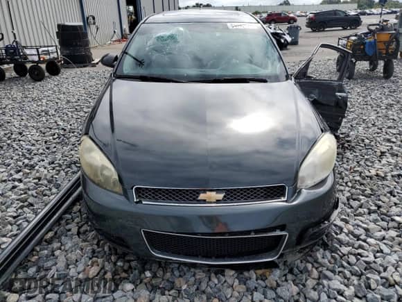 2013 Chevrolet Impala LTZ z VIN 2G1WC5E3XD1175652, wystawiony jako Copart lot #84699035 z przebiegiem 134 389 mil mil oraz Szkoda całkowita • Salvage title. Historia ofert i sprzedaży dostępna na DreamBid. Obrazek 5.