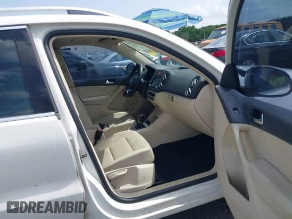 2011 Volkswagen Tiguan S with VIN WVGAV7AX9BW514225, listed as a IAAI auction lot 42461785 with 128,973 mi miles and . Bid and sale history available at DreamBid. Image 5.