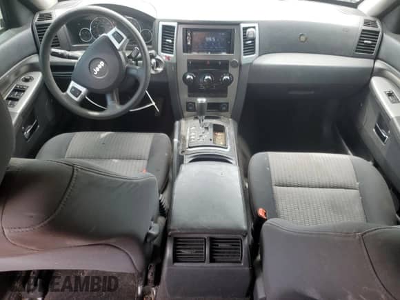 2010 Jeep Grand Cherokee Laredo с VIN 1J4PS4GKXAC136718, выставлен на аукционе Copart как лот 63329035 с пробегом 153 624 миль миль и Списание • Salvage title. История ставок и продаж доступна на DreamBid. Изображение 8.