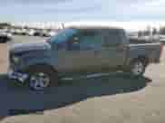 2009 Nissan Frontier SE with VIN 1N6AD07U49C405420, listed as a Copart auction lot 41983545 with 203,700 mi miles and Salvage title. Bid and sale history available at DreamBid. Image 1.