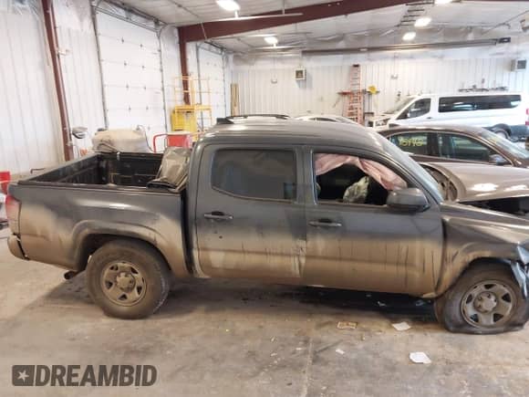 2023 Toyota Tacoma SR with VIN 3TMCZ5AN0PM540529, listed as a IAAI auction lot 43088233 with 75,792 mi miles and . Bid and sale history available at DreamBid. Image 13.