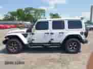 2021 Jeep Wrangler Unlimited Rubicon with VIN 1C4HJXFN0MW648257, listed as a IAAI auction lot 42594545 with 49,410 mi miles and . Bid and sale history available at DreamBid. Image 15.