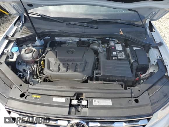 2018 Volkswagen Tiguan S с VIN 3VV1B7AXXJM158851, выставлен на аукционе Copart как лот 80513395 с пробегом 68 087 миль миль и Списание • Salvage title. История ставок и продаж доступна на DreamBid. Изображение 12.