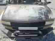 2003 Chevrolet Astro z VIN 1GNDM19X43B106544, wystawiony jako Copart lot #70268865 z przebiegiem Nie podano mil oraz Szkoda całkowita • Salvage title. Historia ofert i sprzedaży dostępna na DreamBid. Obrazek 12.