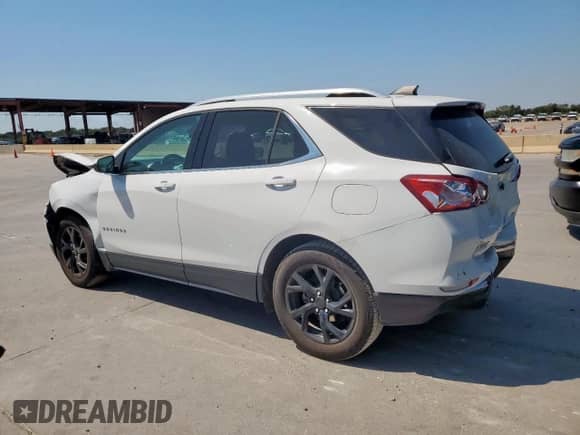 2020 Chevrolet Equinox LT с VIN 3GNAXKEVXLS735427, выставлен на аукционе Copart как лот 80111135 с пробегом 83 405 миль миль и Списание • Salvage title. История ставок и продаж доступна на DreamBid. Изображение 2.