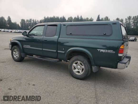 2001 Toyota Tundra Limited z VIN 5TBBT48171S143054, wystawiony jako Copart lot #71740305 z przebiegiem 121 330 mil mil oraz Czysty tytuł • Clean title. Historia ofert i sprzedaży dostępna na DreamBid. Obrazek 2.