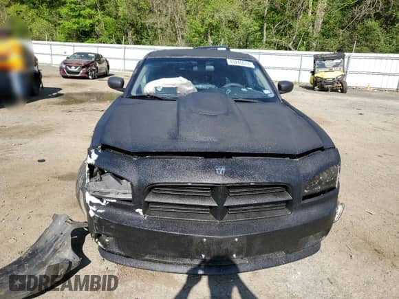 2007 Dodge Charger Police z VIN 2B3KA43H07H771001, wystawiony jako Copart lot #49245074 z przebiegiem 189 240 mil mil oraz Szkoda całkowita • Salvage title. Historia ofert i sprzedaży dostępna na DreamBid. Obrazek 5.
