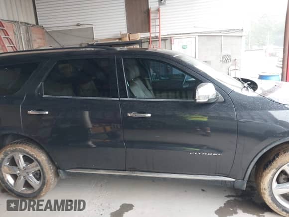 2013 Dodge Durango Citadel with VIN 1C4RDHEG6DC602163, listed as a IAAI auction lot 42901766 with 136,731 mi miles and . Bid and sale history available at DreamBid. Image 13.