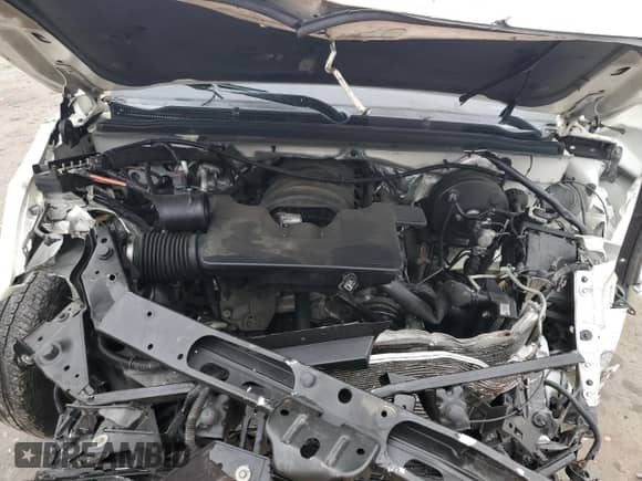 2015 Chevrolet Tahoe LTZ with VIN 1GNSKCKC6FR104063, listed as a Copart auction lot 67675895 with 139,929 mi miles and Salvage title. Bid and sale history available at DreamBid. Image 12.