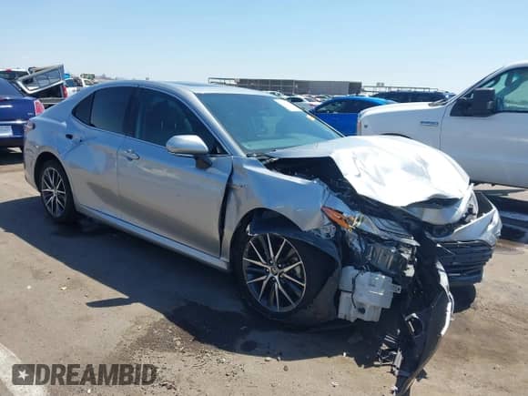 2021 Toyota Camry Hybrid XLE with VIN 4T1F31AK2MU547062, listed as a IAAI auction lot 42405027 with 170,899 mi miles and . Bid and sale history available at DreamBid. Image 1.
