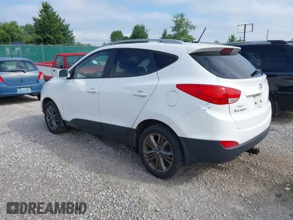 2014 Hyundai Tucson Limited with VIN KM8JUCAG0EU870929, listed as a IAAI auction lot 42864934 with 198,247 mi miles and . Bid and sale history available at DreamBid. Image 3.
