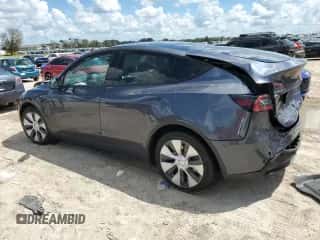 2023 Tesla Model Y Long Range with VIN 7SAYGAEE6PF661104, listed as a Copart auction lot 69421904 with 34,605 mi miles and Salvage title. Bid and sale history available at DreamBid. Image 2.