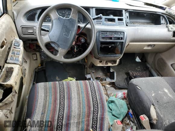 1996 Honda Odyssey with VIN JHMRA1846TC001737, listed as a Copart auction lot 49045655 with 230,785 mi miles and Salvage title. Bid and sale history available at DreamBid. Image 8.