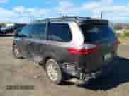 2015 Toyota Sienna Limited with VIN 5TDDK3DC5FS094285, listed as a Copart auction lot 69846845 with 104,048 mi miles and Salvage title. Bid and sale history available at DreamBid. Image 2.