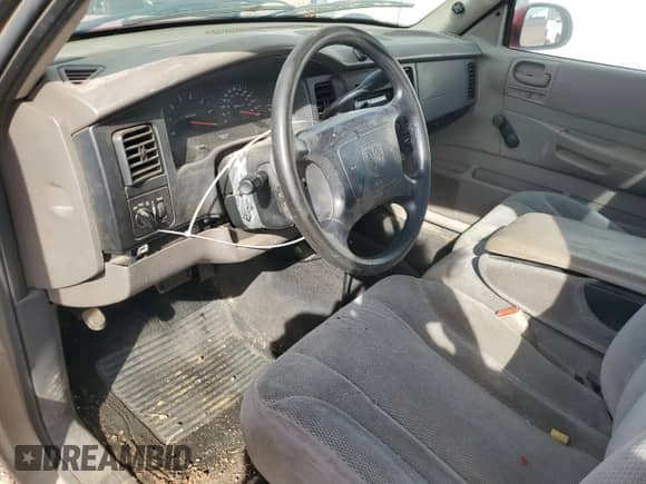 2003 Dodge Dakota z VIN 1D7FL16X43S151286, wystawiony jako Copart lot #50904925 z przebiegiem 129 412 mil mil oraz Szkoda całkowita • Salvage title. Historia ofert i sprzedaży dostępna na DreamBid. Obrazek 8.