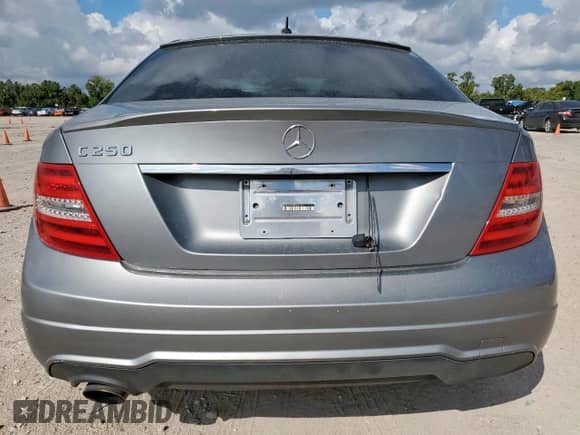 2014 Mercedes-Benz C 250 Sport with VIN WDDGF4HB0EG254273, listed as a Copart auction lot 70661895 with 117,284 mi miles and Salvage title. Bid and sale history available at DreamBid. Image 6.