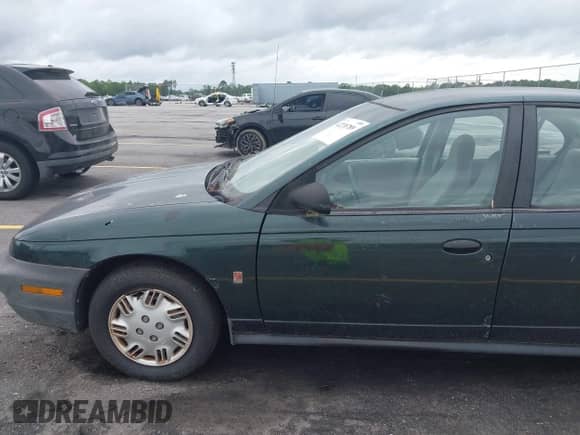 1998 Saturn SL с VIN 1G8ZH5280WZ295857, выставлен на аукционе IAAI как лот 42238789 с пробегом 153 163 миль миль и . История ставок и продаж доступна на DreamBid. Изображение 19.