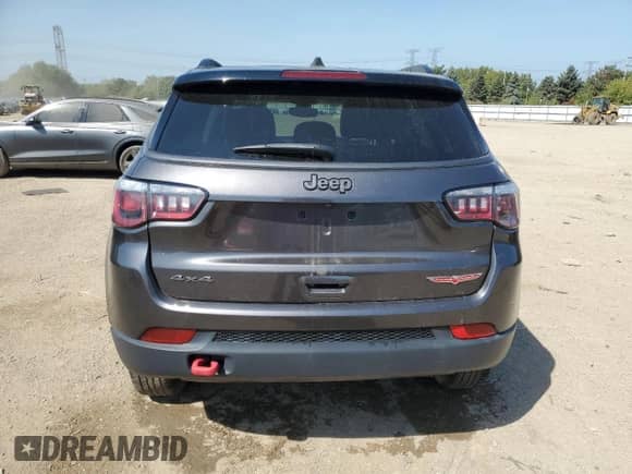 2020 Jeep Compass Trailhawk with VIN 3C4NJDDBXLT163395, listed as a Copart auction lot 81366435 with 56,199 mi miles and Salvage title. Bid and sale history available at DreamBid. Image 6.