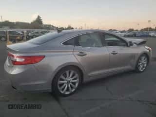 2013 Hyundai Azera с VIN KMHFH4JG7DA203159, выставлен на аукционе Copart как лот 77546384 с пробегом 163 509 миль миль и Списание • Salvage title. История ставок и продаж доступна на DreamBid. Изображение 3.