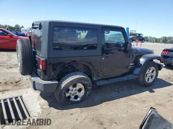 2014 Jeep Wrangler Sahara z VIN 1C4AJWBG4EL196867, wystawiony jako Copart lot #71590205 z przebiegiem 121 968 mil mil oraz Szkoda całkowita • Salvage title. Historia ofert i sprzedaży dostępna na DreamBid. Obrazek 3.