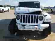 2021 Jeep Wrangler Unlimited Sahara High Altitude with VIN 1C4HJXENXMW509657, listed as a Copart auction lot 64983465 with 87,621 mi miles and Salvage title. Bid and sale history available at DreamBid. Image 14.